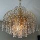 Vintage brass chandelier with crystal tassels cascade