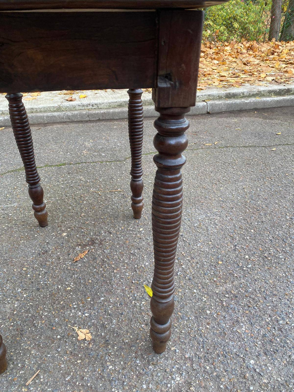 Solid wood table with turned legs, 19th century, 77x42cm