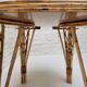 Vintage Audoux Minet bamboo, rattan, and smoked glass table duo.