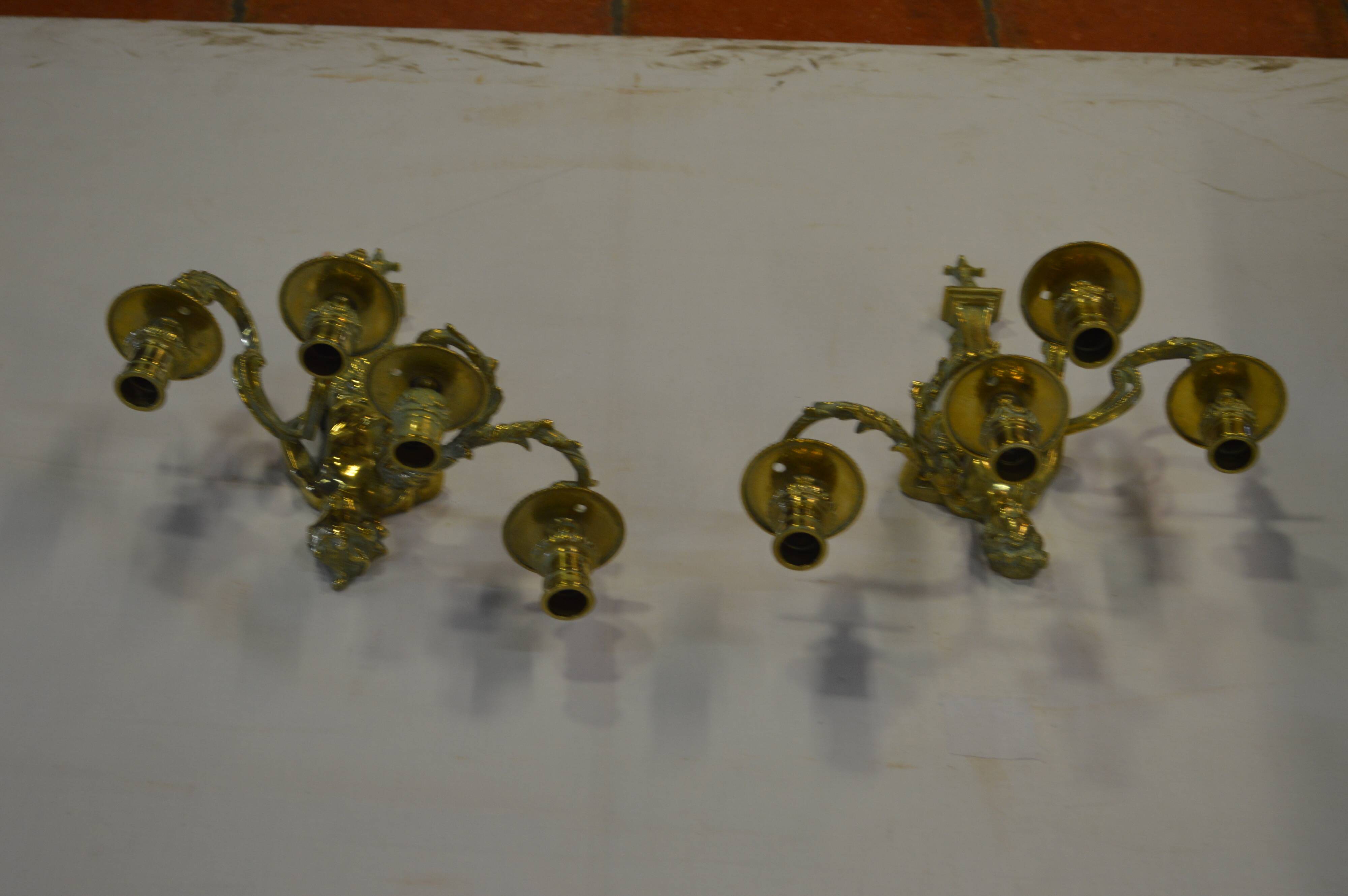 Louis XV style bronze sconces with cariatids