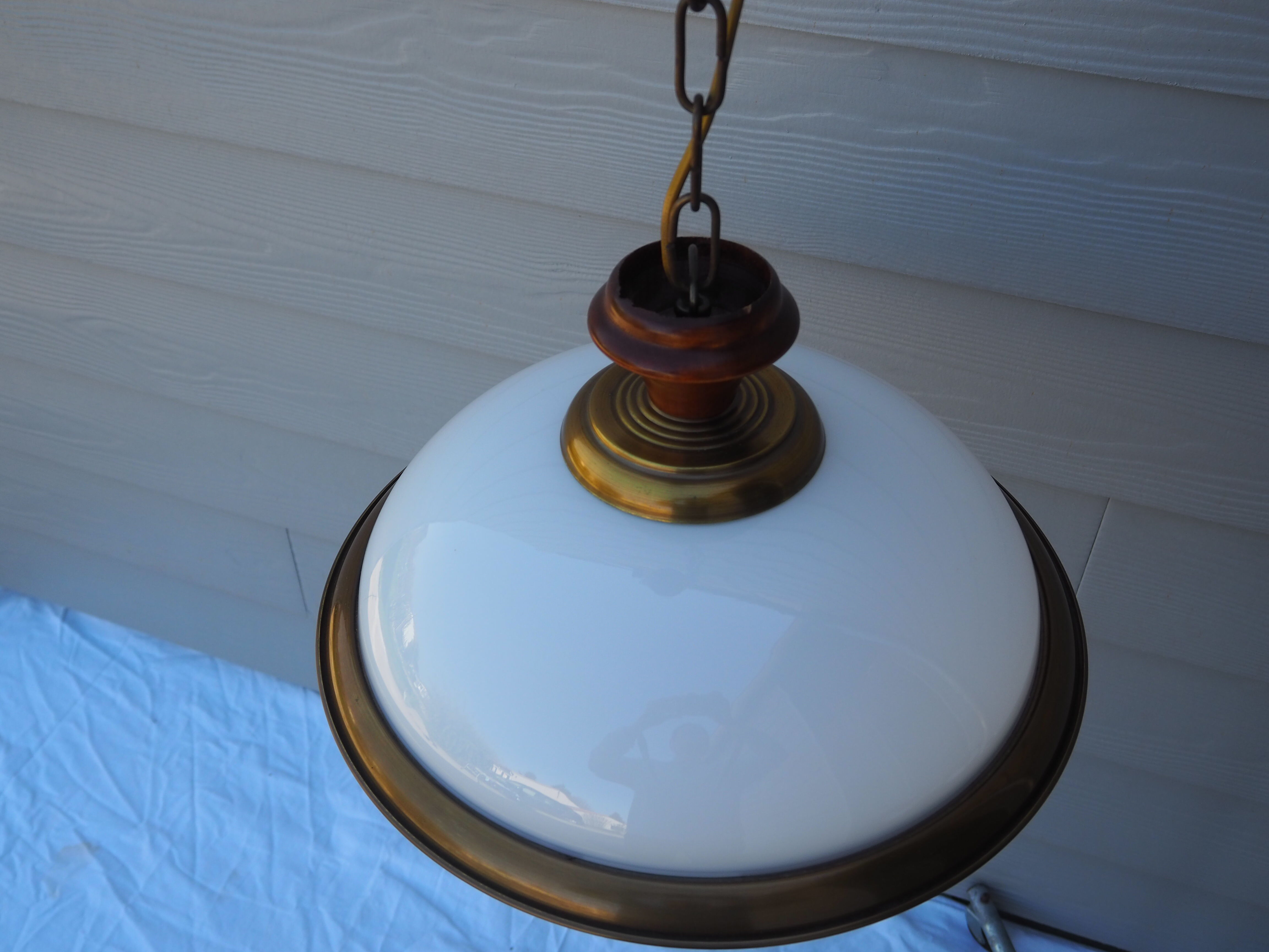 Suspension in white opaline, its edge in aged brass