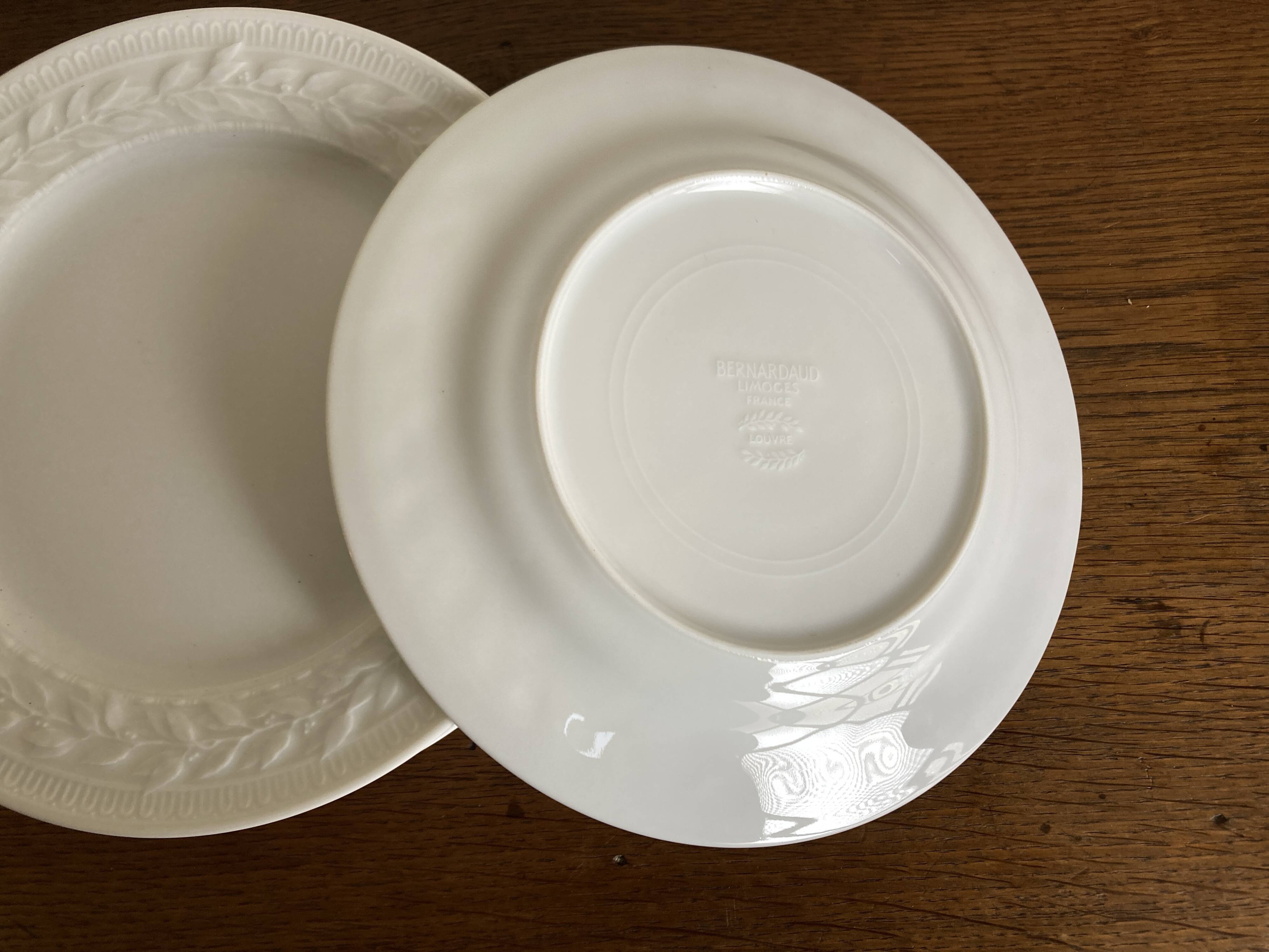 set of 8 Bernardaud Louvre neo-classical plates with laurel wreath design