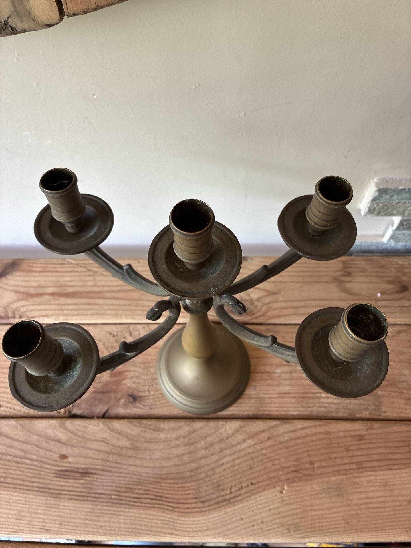Pair of large 5-light candlesticks in patinated brass, classical style.