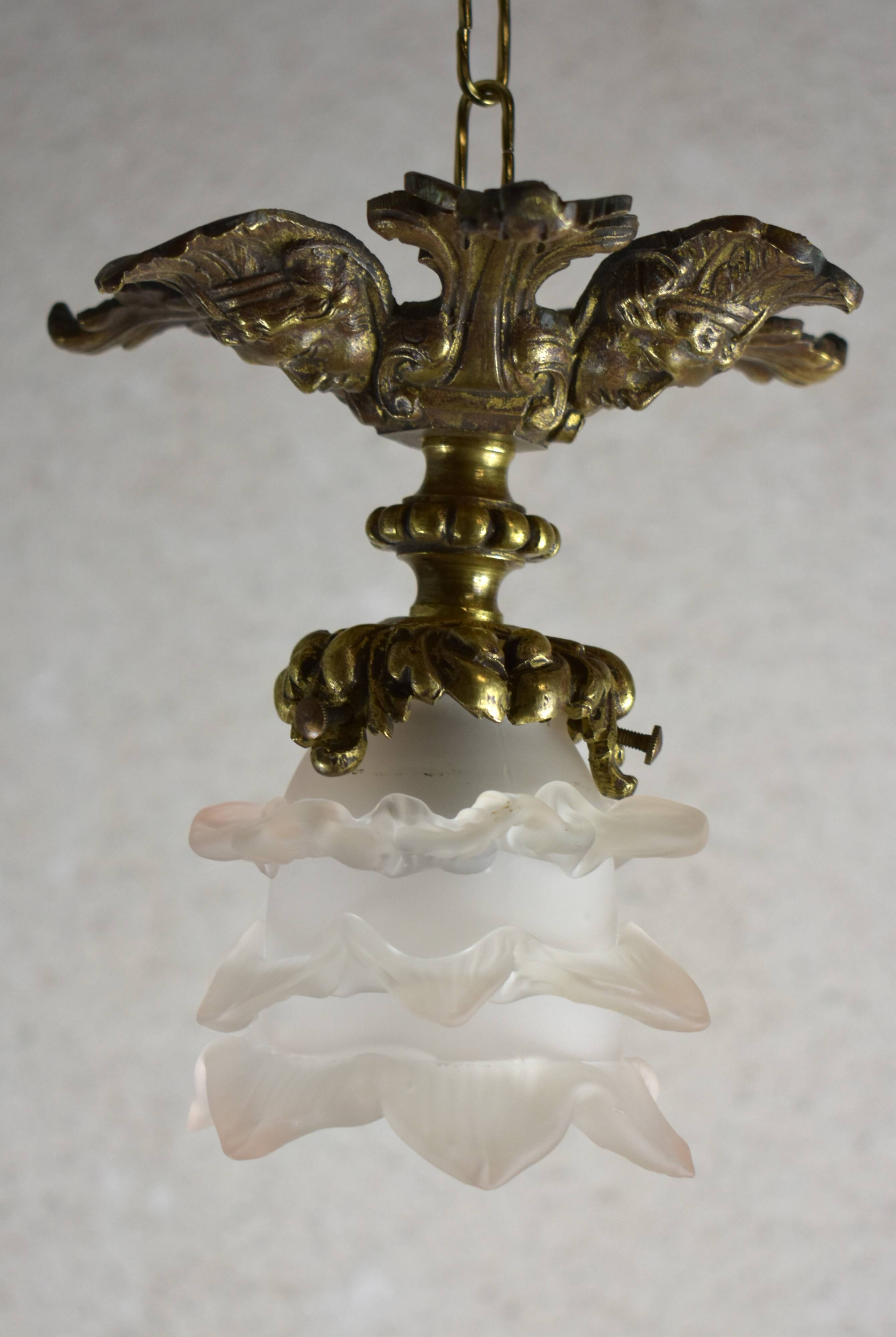 Suspension in bronze and glass paste.