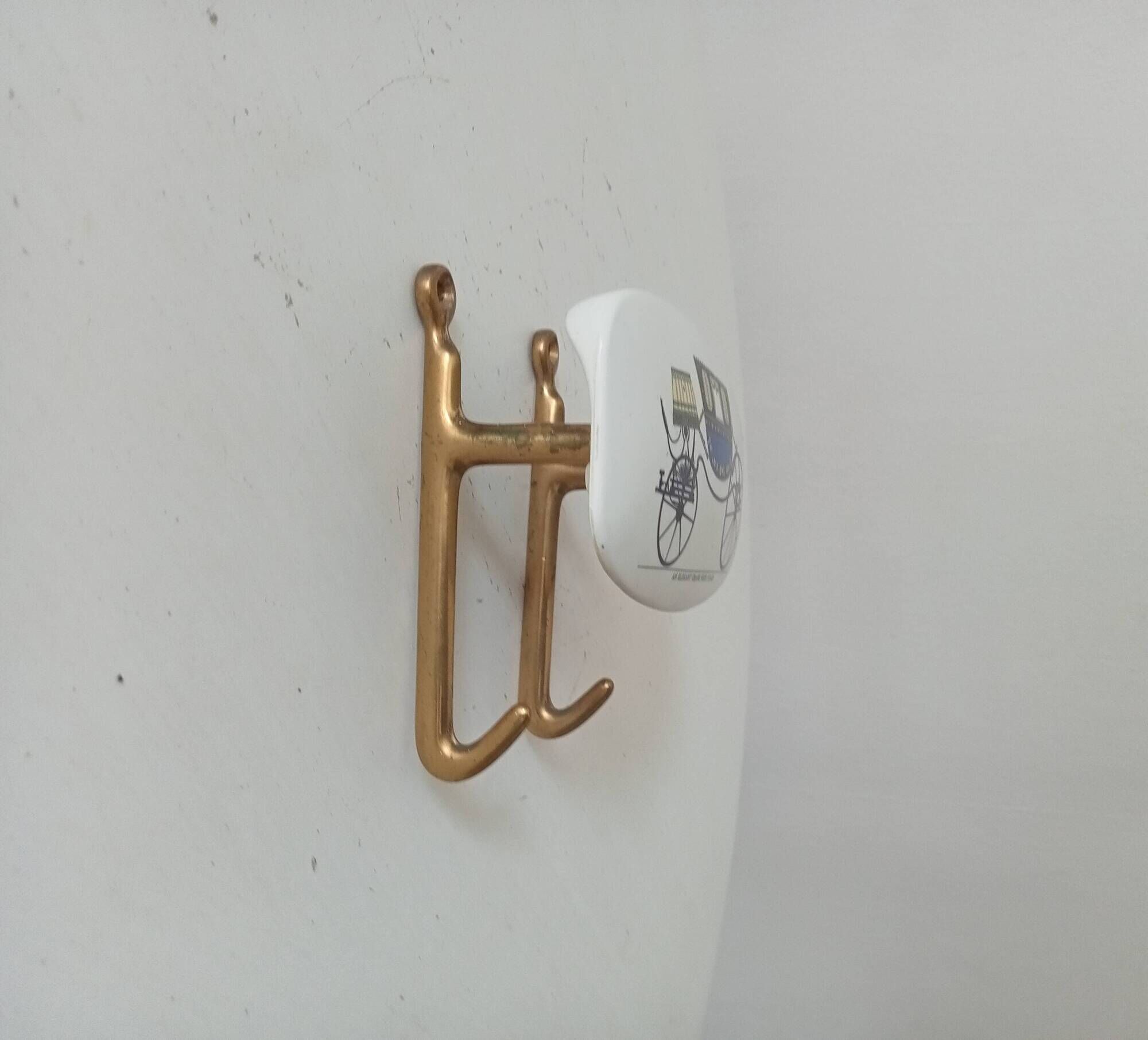 Set of 2 wall coat hooks in Bakelite and brass from the 1950s/60s.