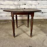 Oval shuttered dining table