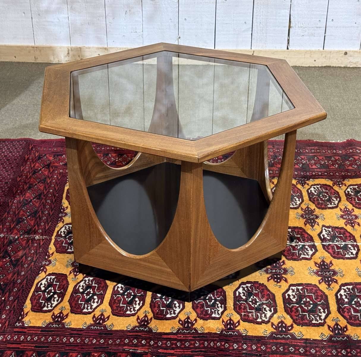 1970s octagonal GPlan gueridon in teak with a glass top.