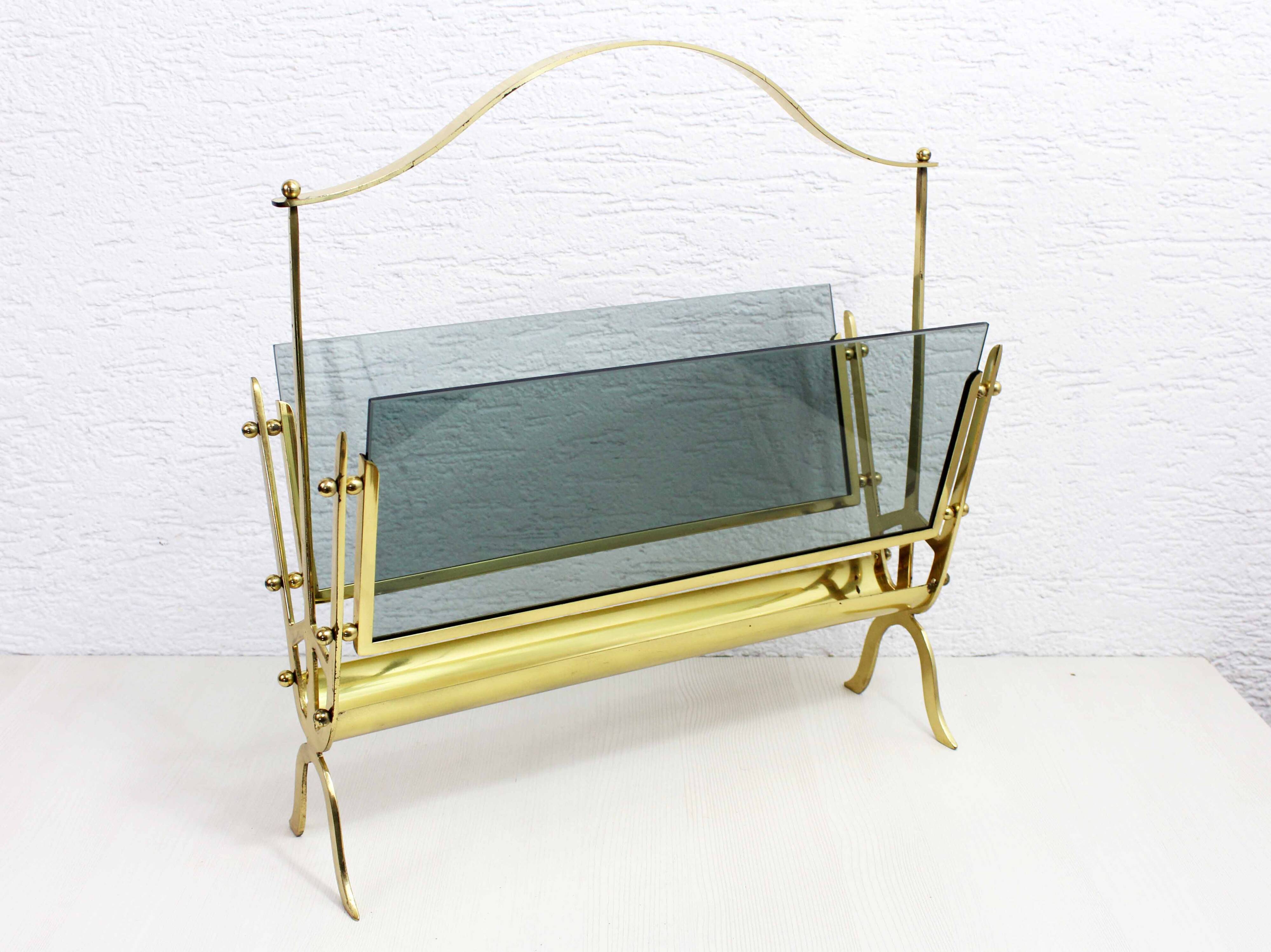 Glass and brass magazine rack, 1970