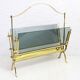 Glass and brass magazine rack, 1970
