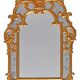 Console with a gilded wooden mirror.