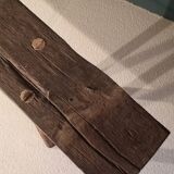 Old rough bench made of solid wood