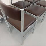 Set of 6 vintage chairs from the 70s in chrome metal and brown faux leather.
