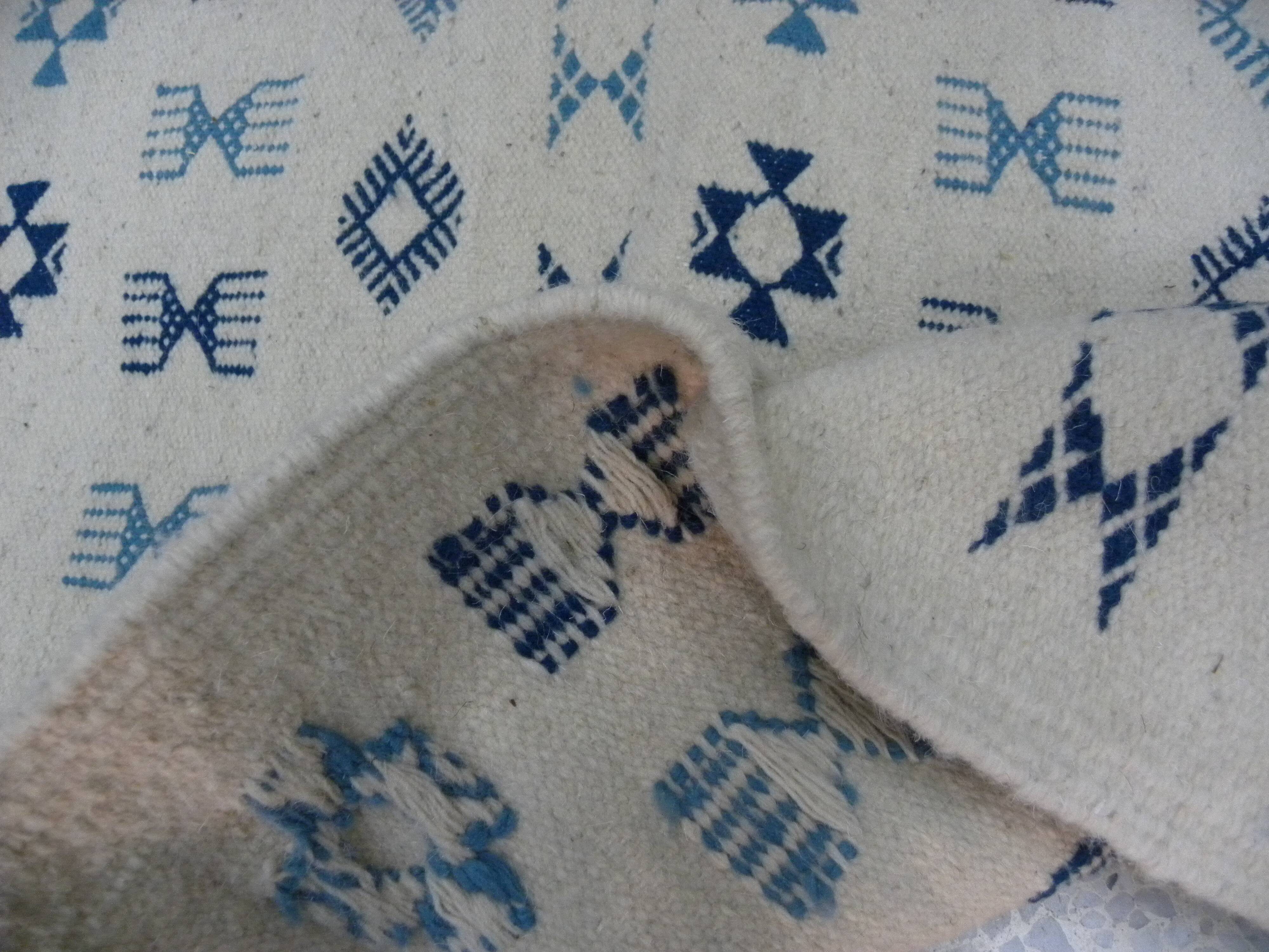 Nomadic Tunisian Berber rug, margoum kilim, ethnic in beige and blue wool.