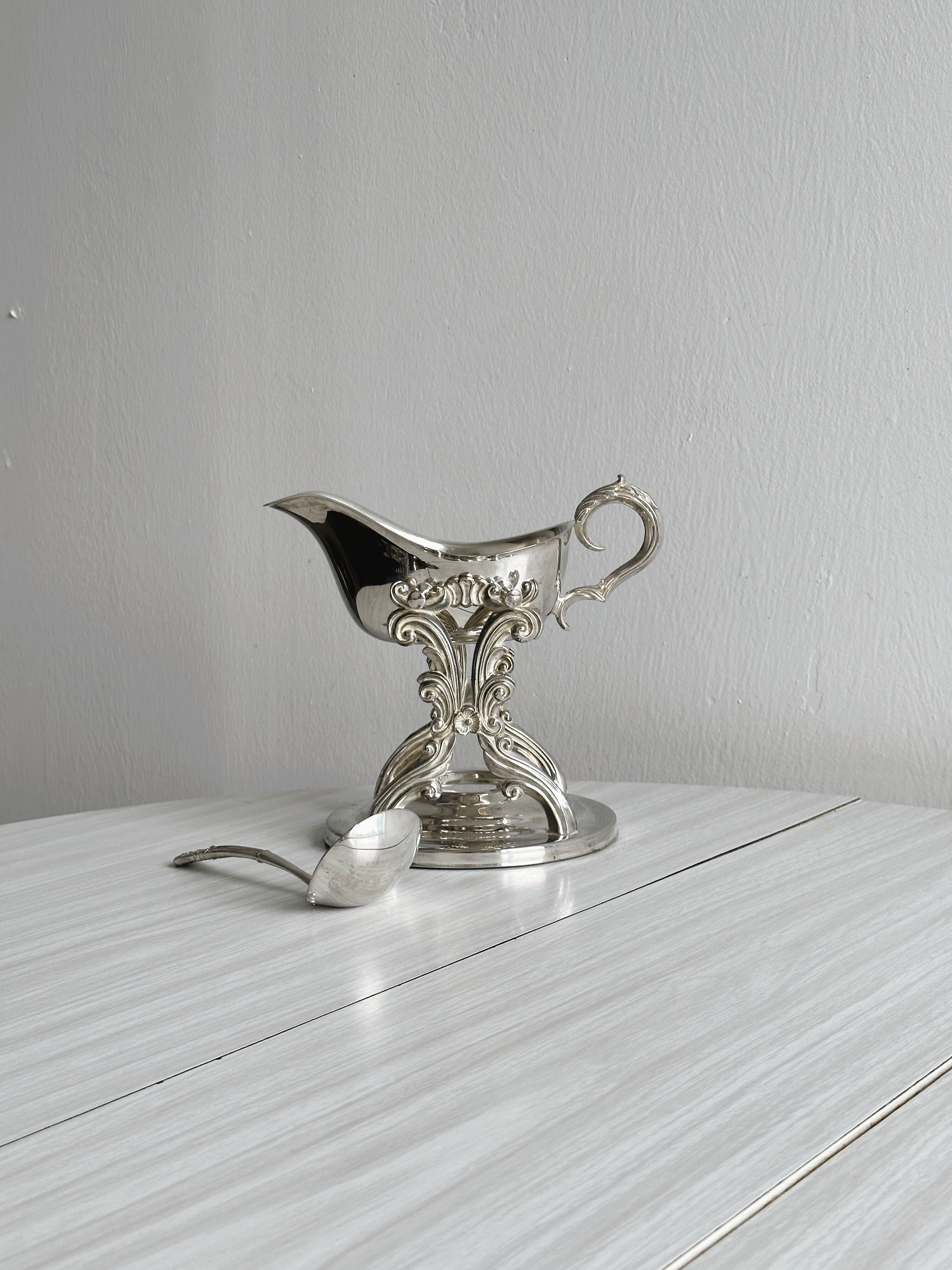antique metal sauceboat with candle warmer and ladle