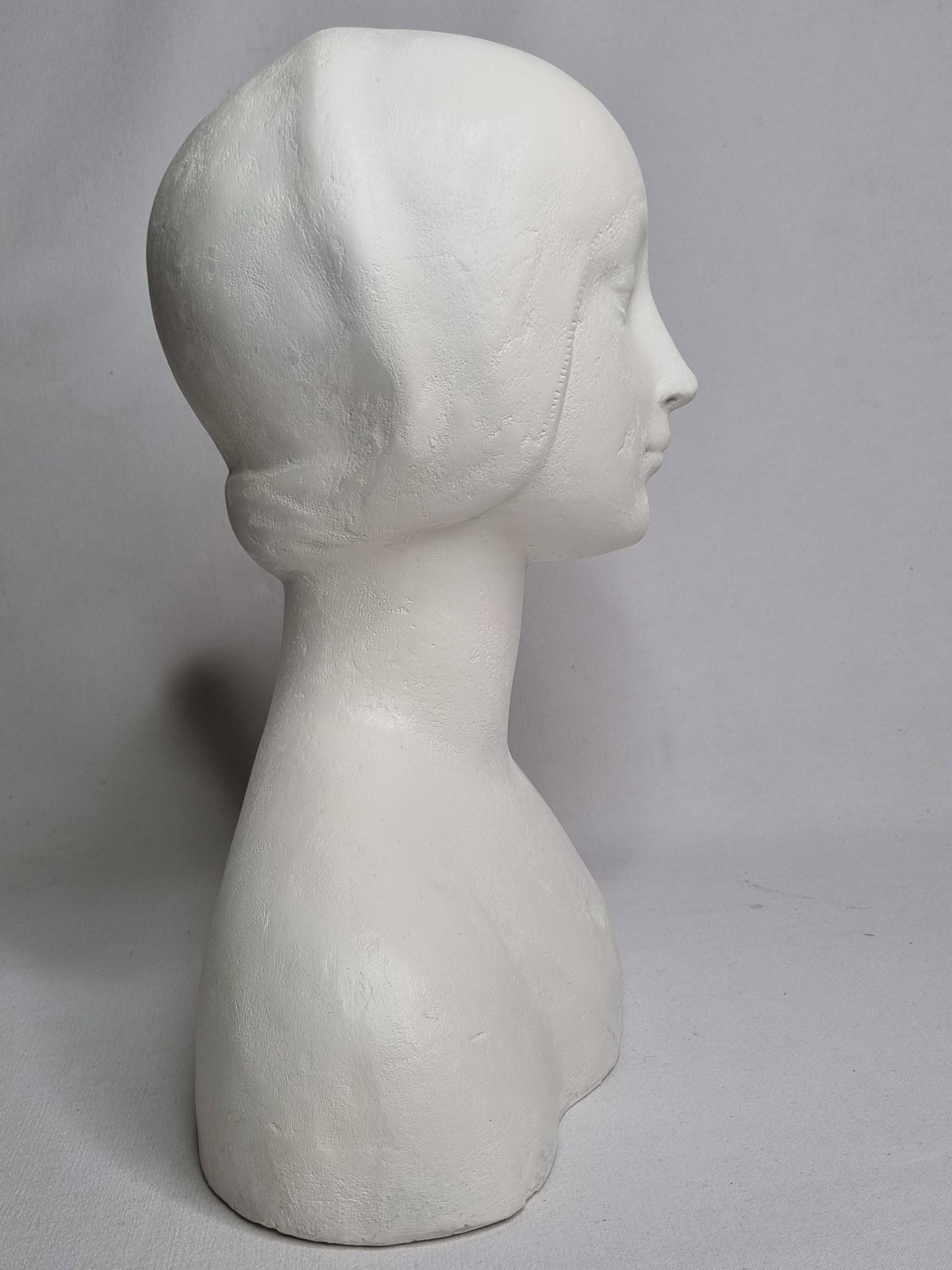 Bust after Laurana in Renaissance style, known as Aragon, patinated plaster, 33 cm.
