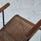 Pair of Swiss stackable rattan and iron dining elbow chairs, G Legler 1960s