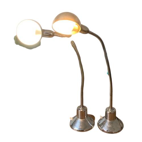 Pair of vintage chrome metal desk lamps with adjustable goosenecks.