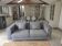 Three-seater grey mottled fabric sofa