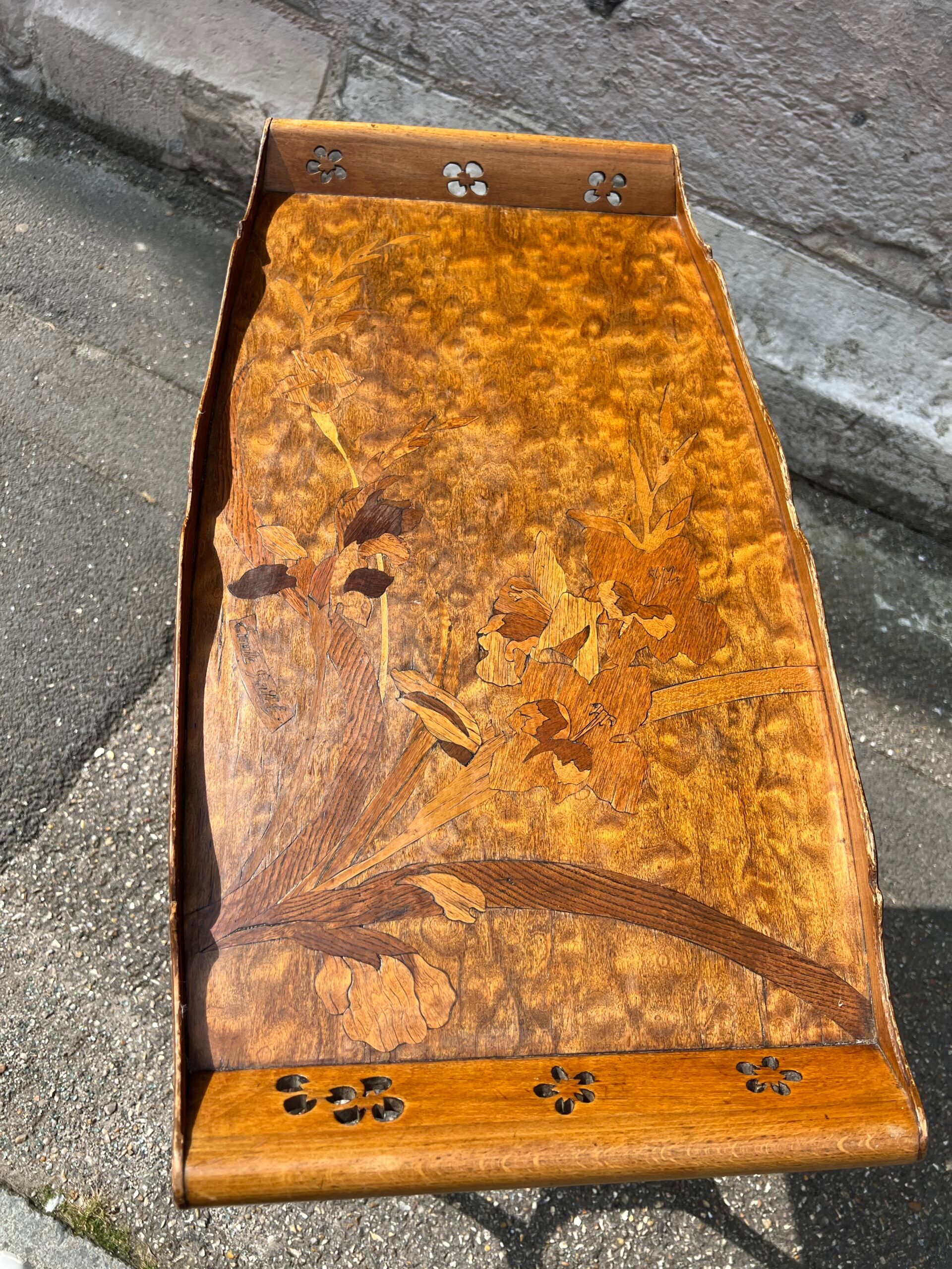 Art Nouveau period two-tiered tea table in veneered wood, signed Émile Gallé