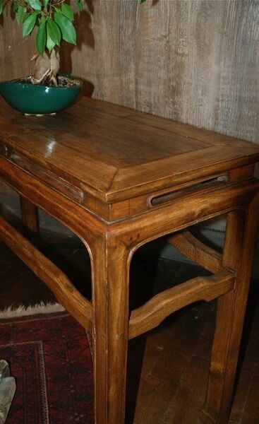 Old Chinese console with lacquer finish.