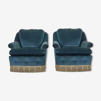 Pair of blue velvet armchairs with fringes