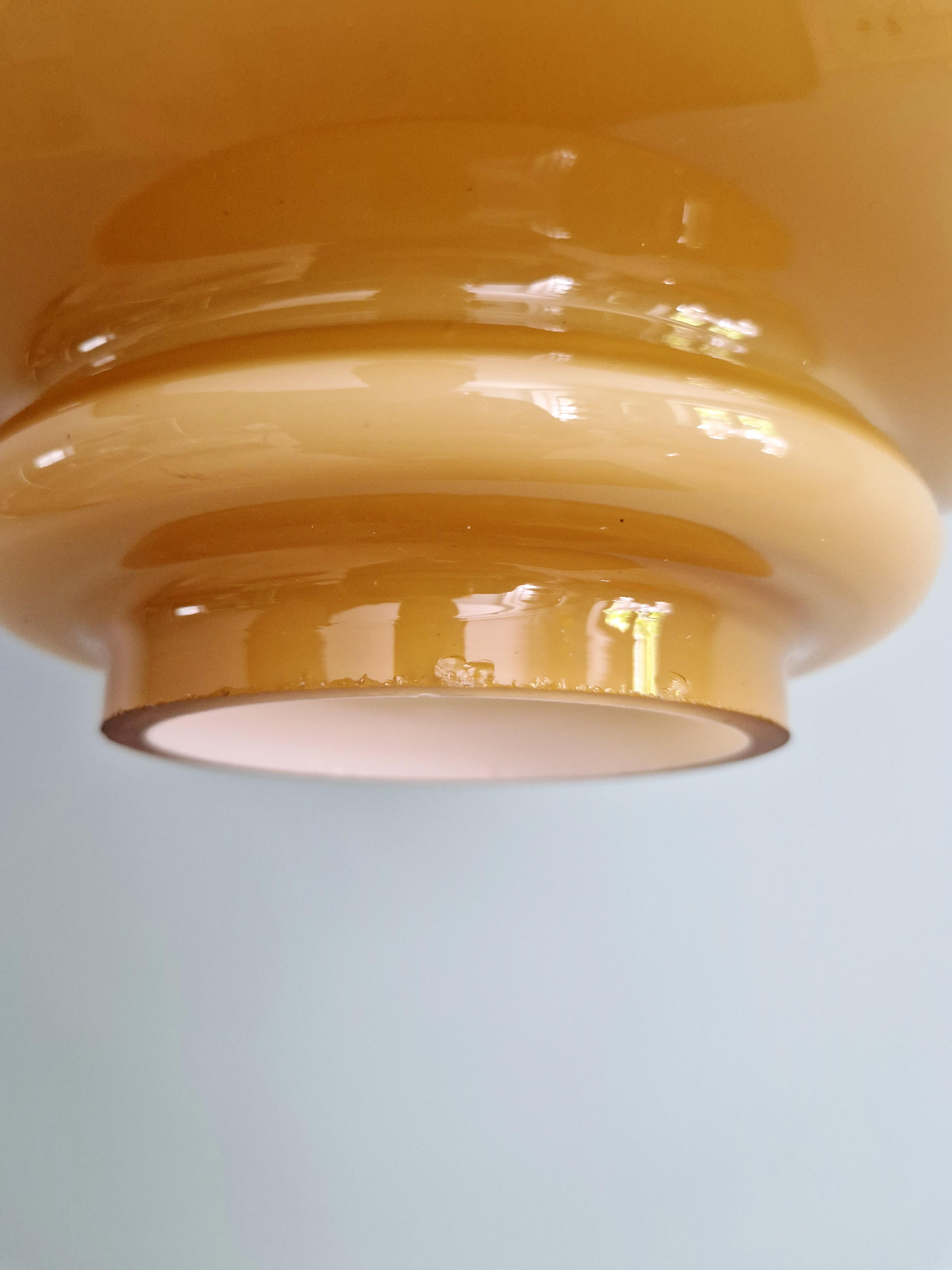 Scandinavian suspension light in mustard opaline, H-A Jakobsson, 1970.