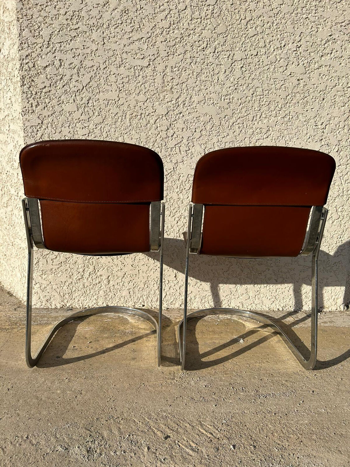 Pair of leather and chromed metal chairs year 70