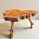 Olive root coffee table in brutalist style.