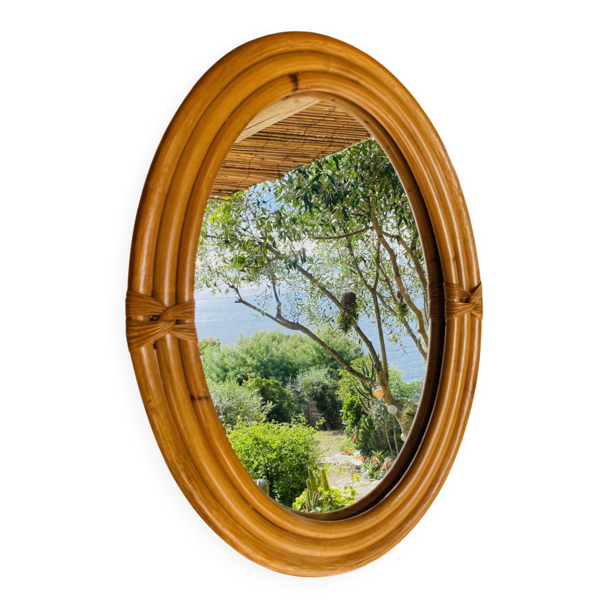 Vintage oval rattan mirror