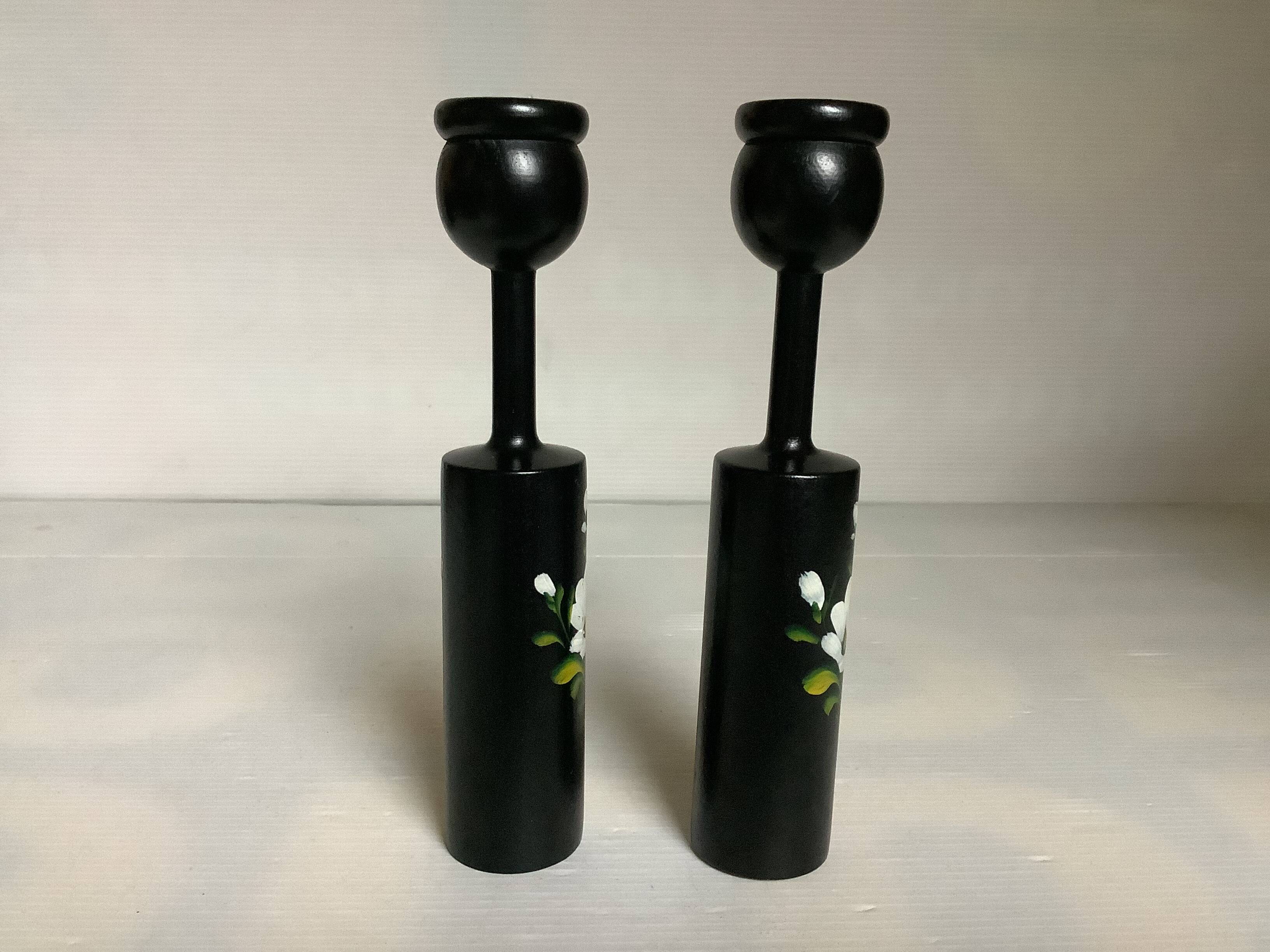 Pair of painted wooden candlesticks