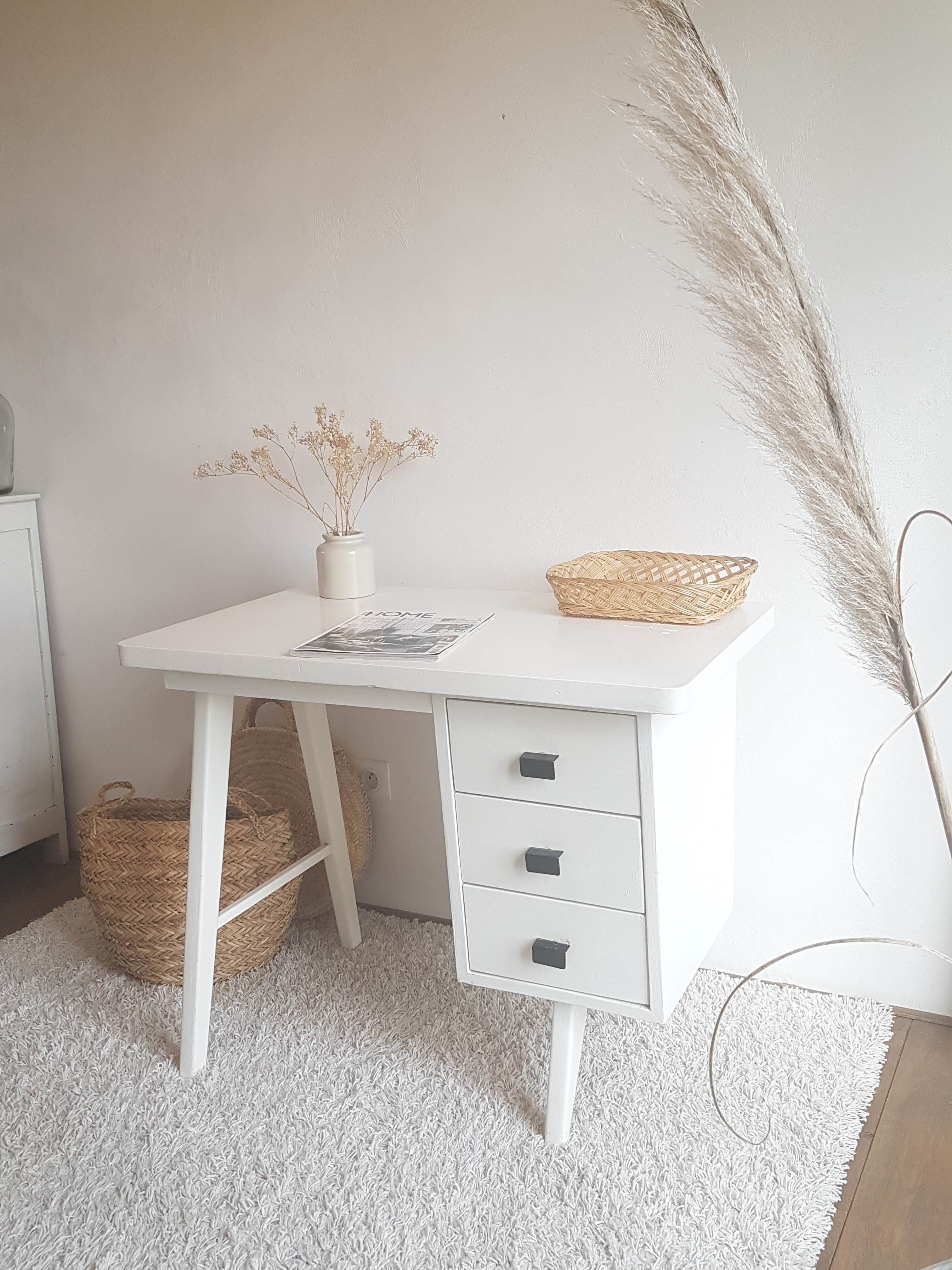 White desk with compass feet circa 1960