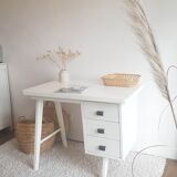 White desk with compass feet circa 1960