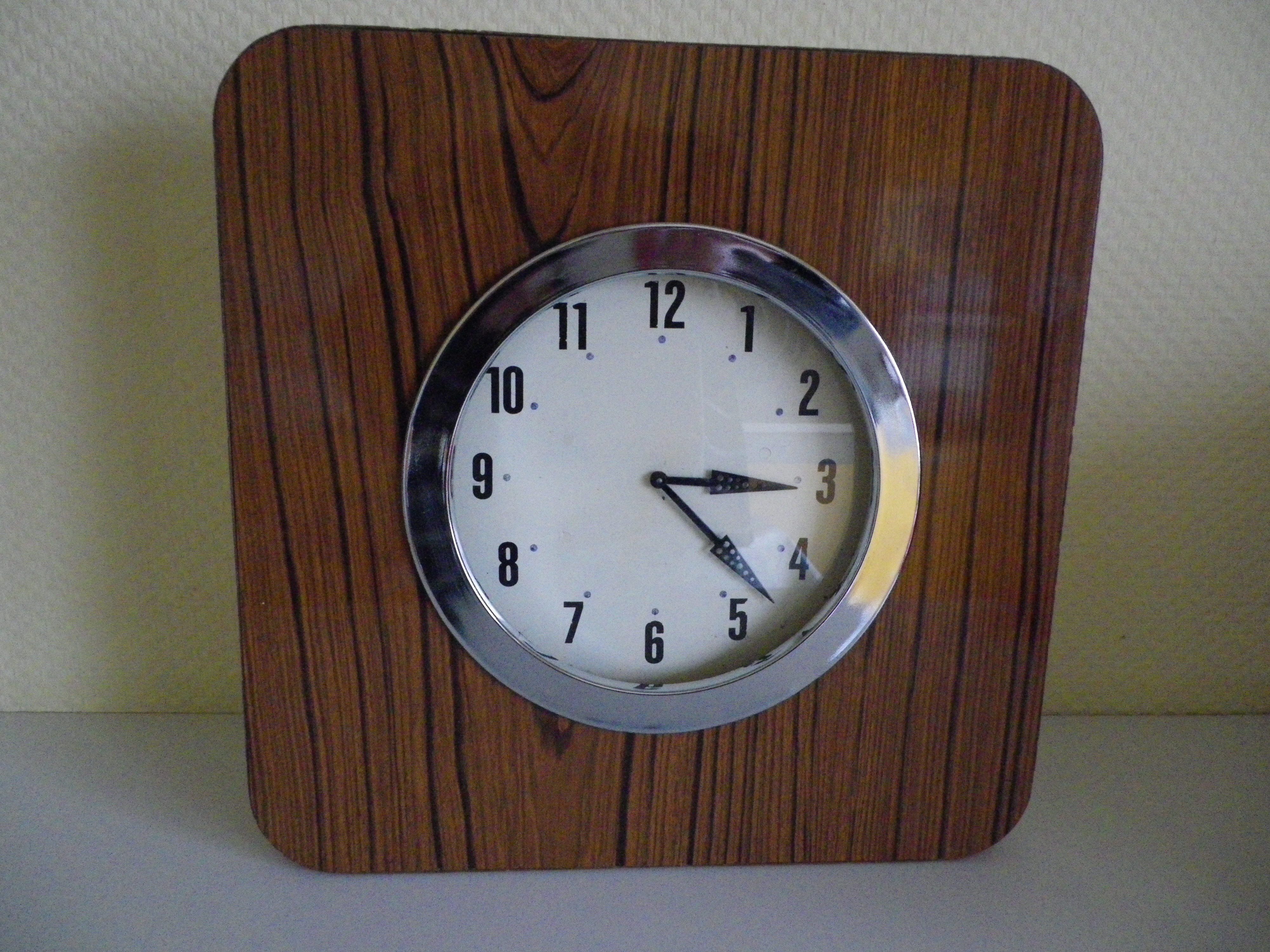 Electric wall clock in formica - 1950s