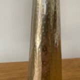 Pair of hammered metal candlesticks