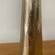 Pair of hammered metal candlesticks