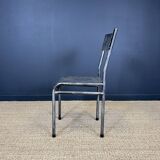Pair of gray metal industrial chairs