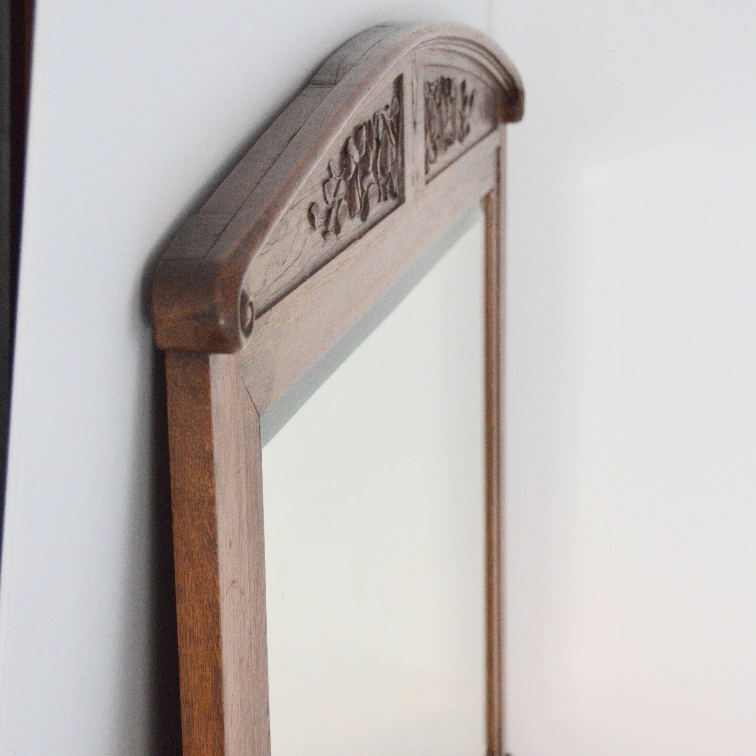 Bevelled Art Nouveau mirror in oak, vintage 1920.