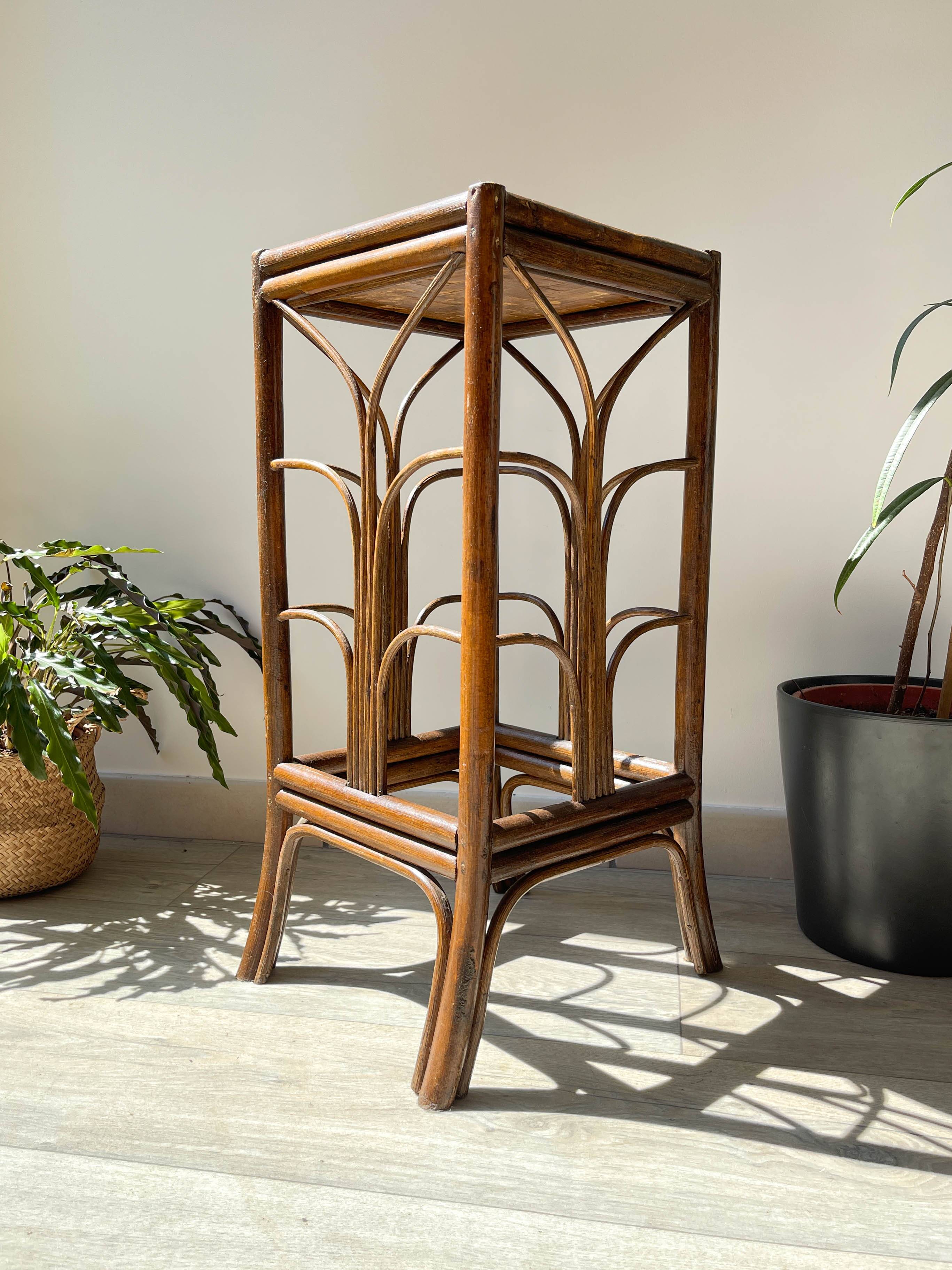 Vintage rattan plant stand in Art Deco style