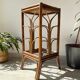 Vintage rattan plant stand in Art Deco style