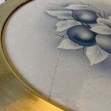 Art Nouveau plate in earthenware with a brass frame