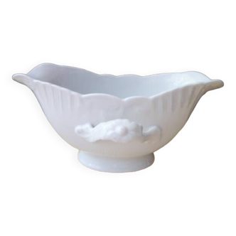 Old white porcelain gravy boat