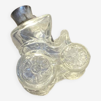 Vintage Avon perfume bottle in the shape of a horse-drawn carriage