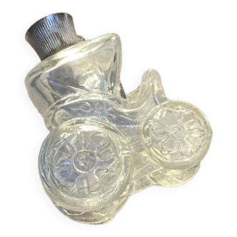 Vintage Avon perfume bottle in the shape of a horse-drawn carriage