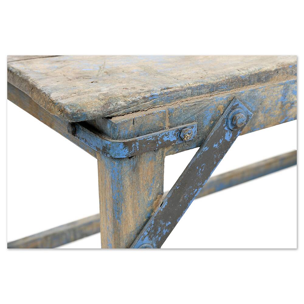 Wooden coffee table and metal reinforcements with blue patina