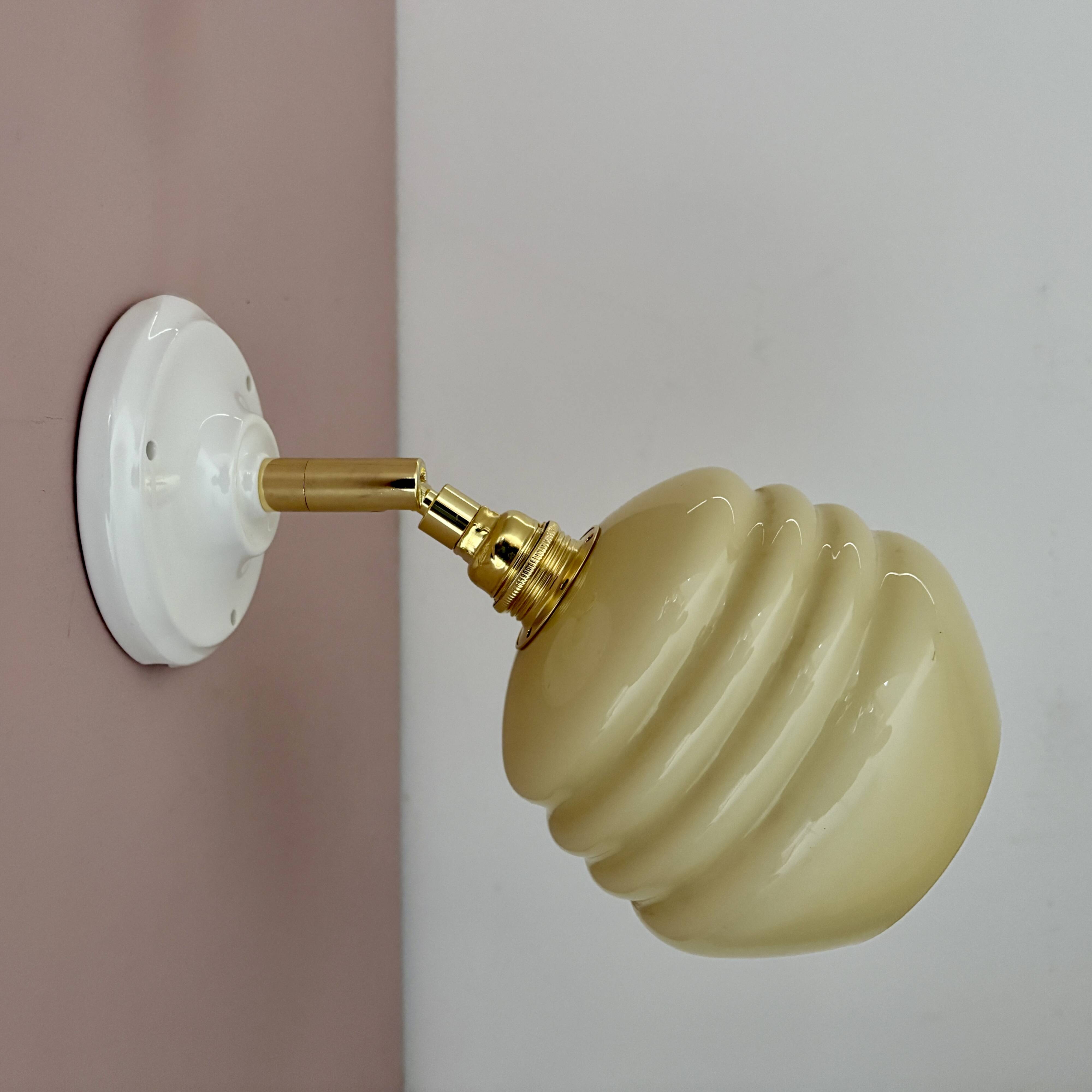 Vintage globe wall lamp in pale yellow opaline