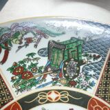Chinese dish decorated with peacocks and plants