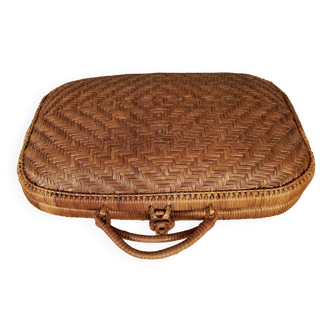 Small woven rattan suitcase