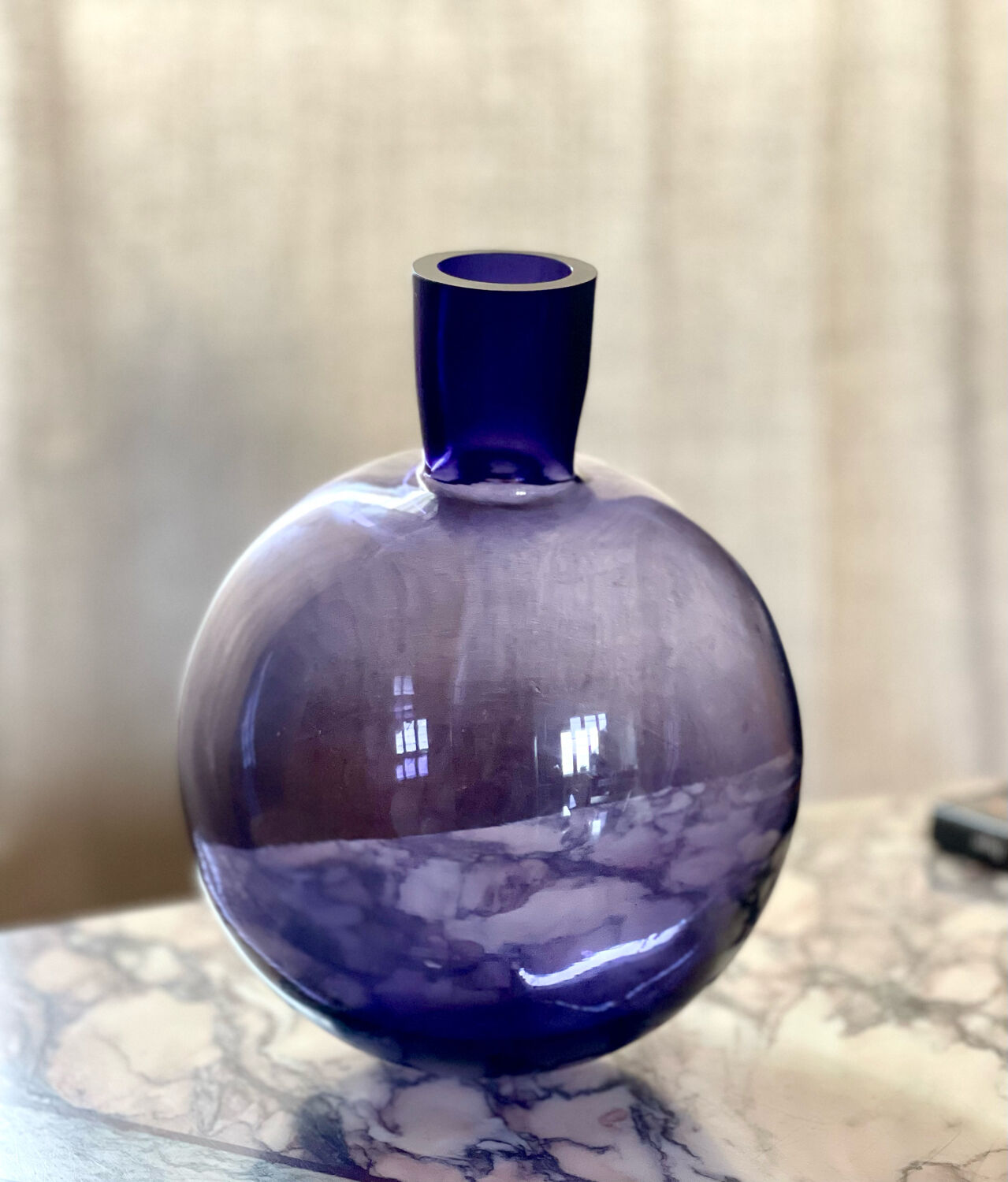 Purple vase inclined