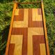 Pine coffee table, 1970s marquetry top, vinyl record rack.
