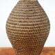 Old basket, burgundy straw and bramble, woven basket, interior decoration